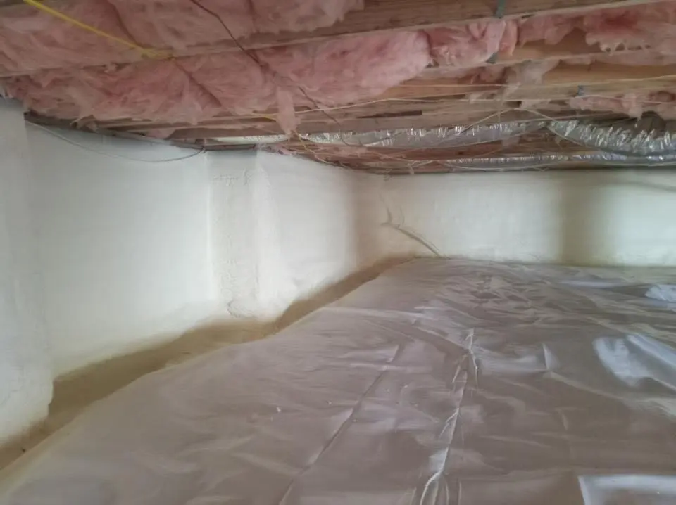 Crawl space encapsulation with closed-cell spray foam for Flat Roof Repair in Pierre